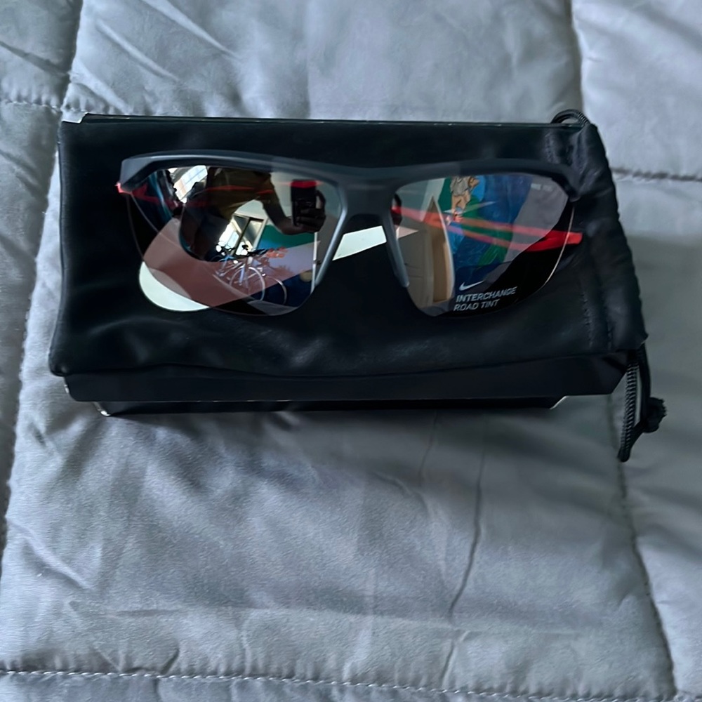 Nike sunglasses. Nike tail winde road. Great for running biking